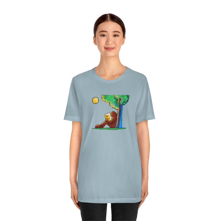 Bigfoot Reading How to Mingle Unisex Soft Cotton T-Shirt