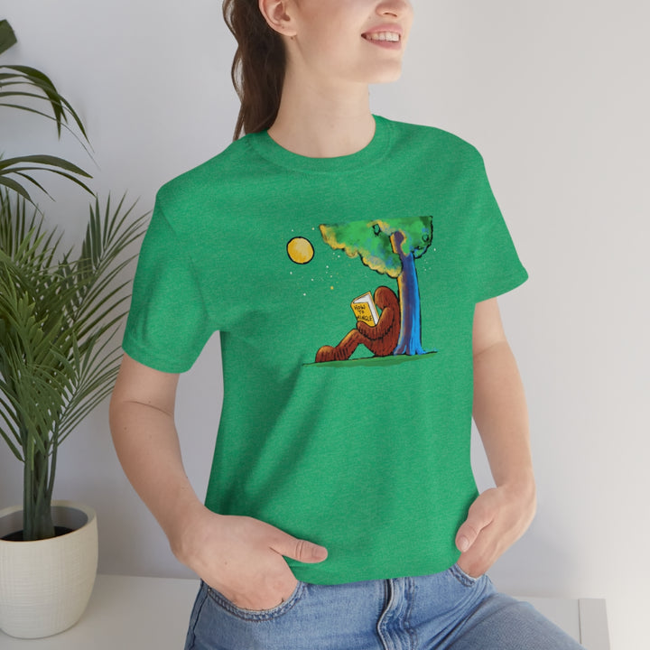 Bigfoot Reading How to Mingle Unisex Soft Cotton T-Shirt