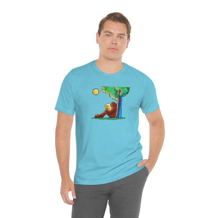 Bigfoot Reading How to Mingle Unisex Soft Cotton T-Shirt