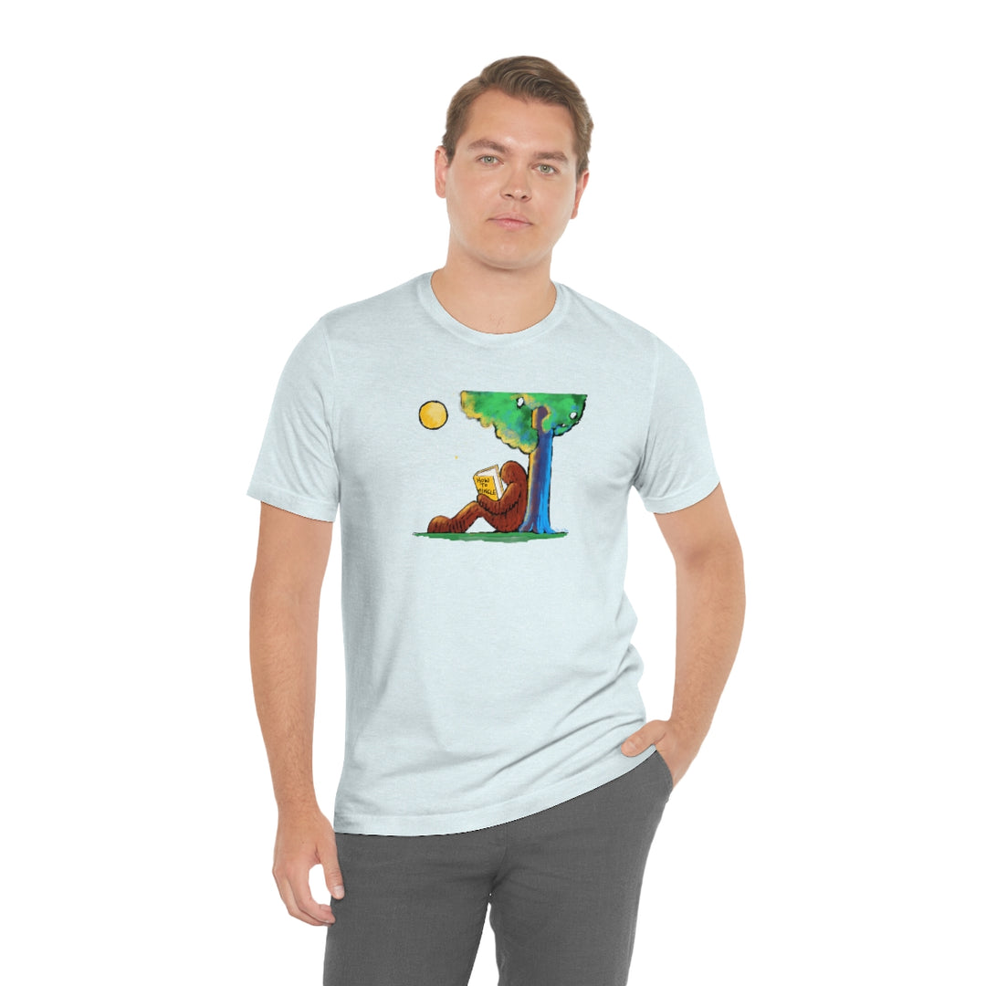 Bigfoot Reading How to Mingle Unisex Soft Cotton T-Shirt